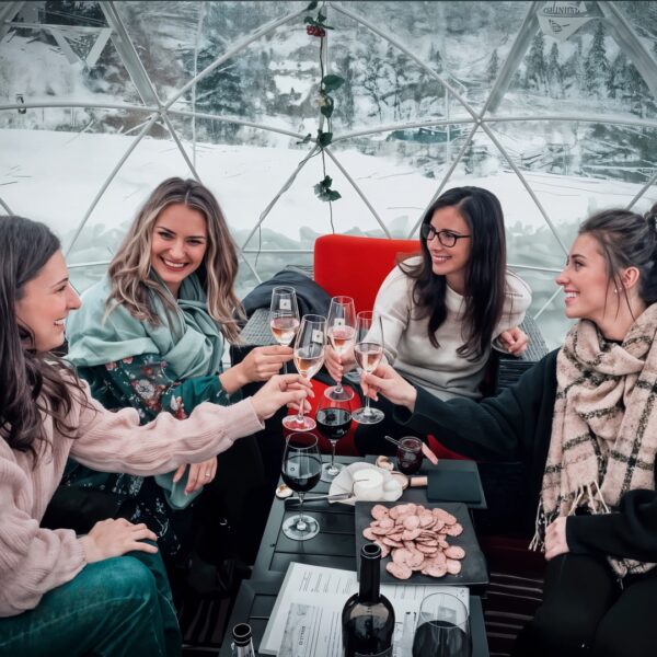 Group of Friends drinking wine at Silvara Cellars' Igloo in Leavenworth Washington